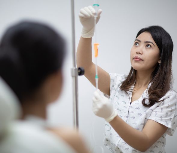 Nurse administering infusion